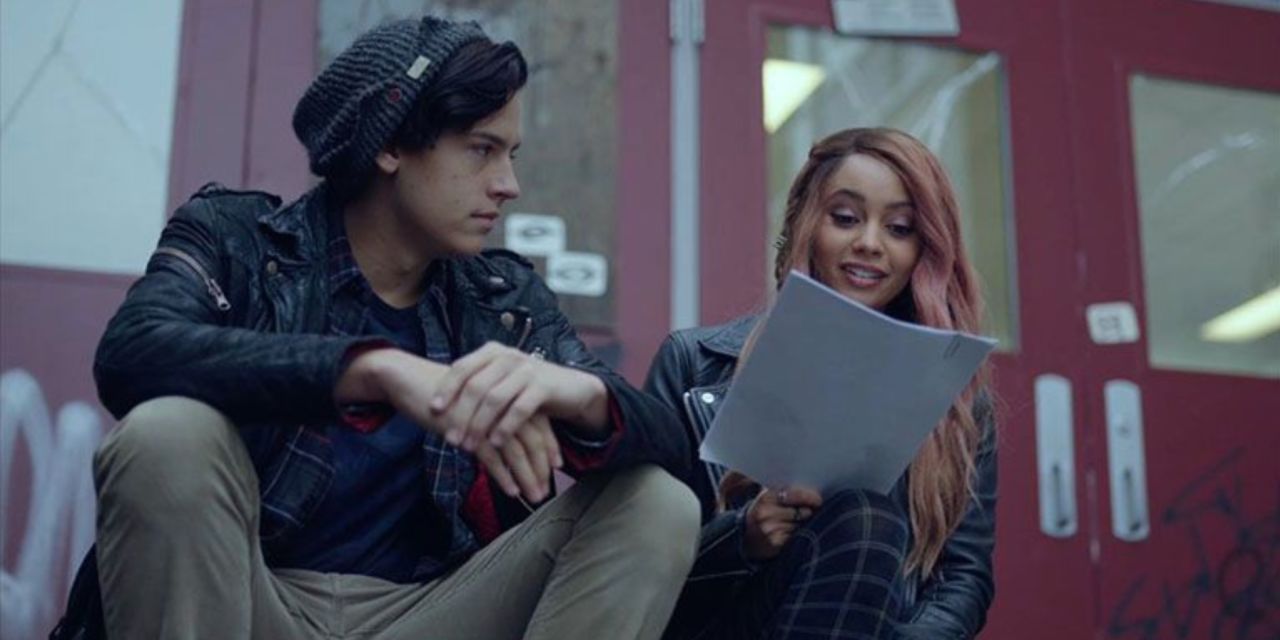 Jughead and Toni look at paper together in Riverdale