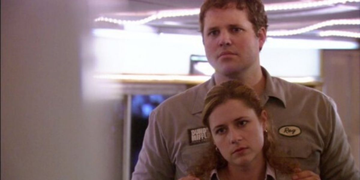 Pam and Roy hugging each other on The Office