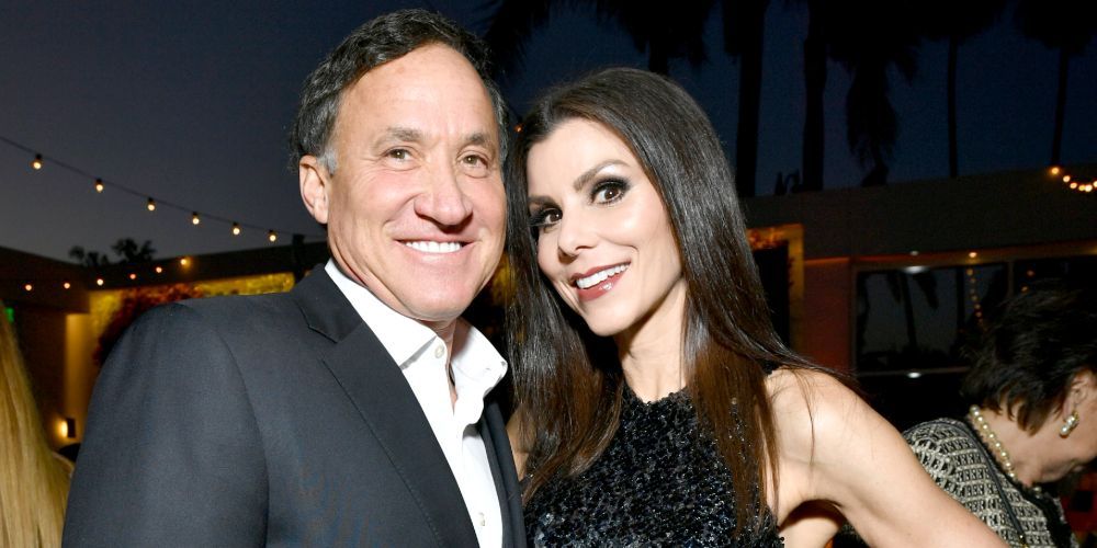 Terry and Heather Dubrow from RHOC posing for a photo