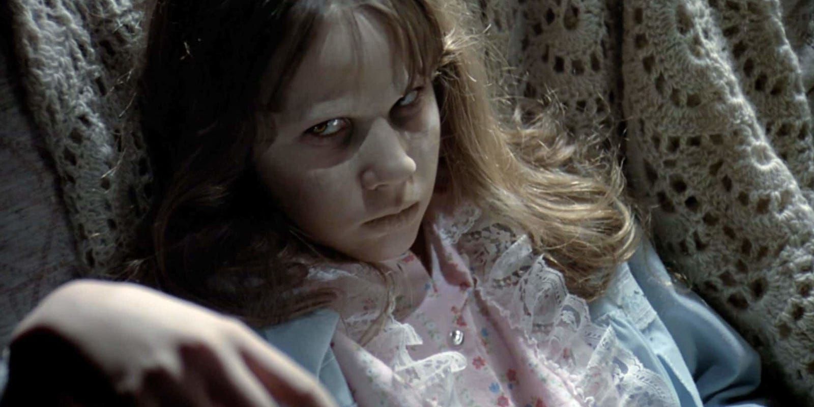Linda Blair as Regan O'Neil in the Exorcist looking possessed.