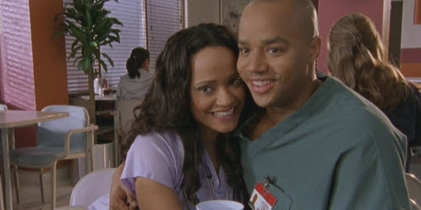 Judy Reyes and Donald Faison smiling as Carla and Turk in Scrubs