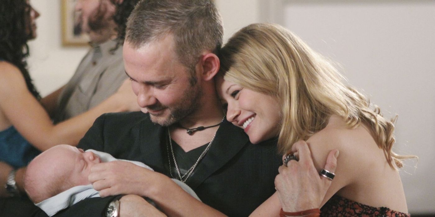 Charlie and Claire smile and hold baby Aaron in the Lost series finale