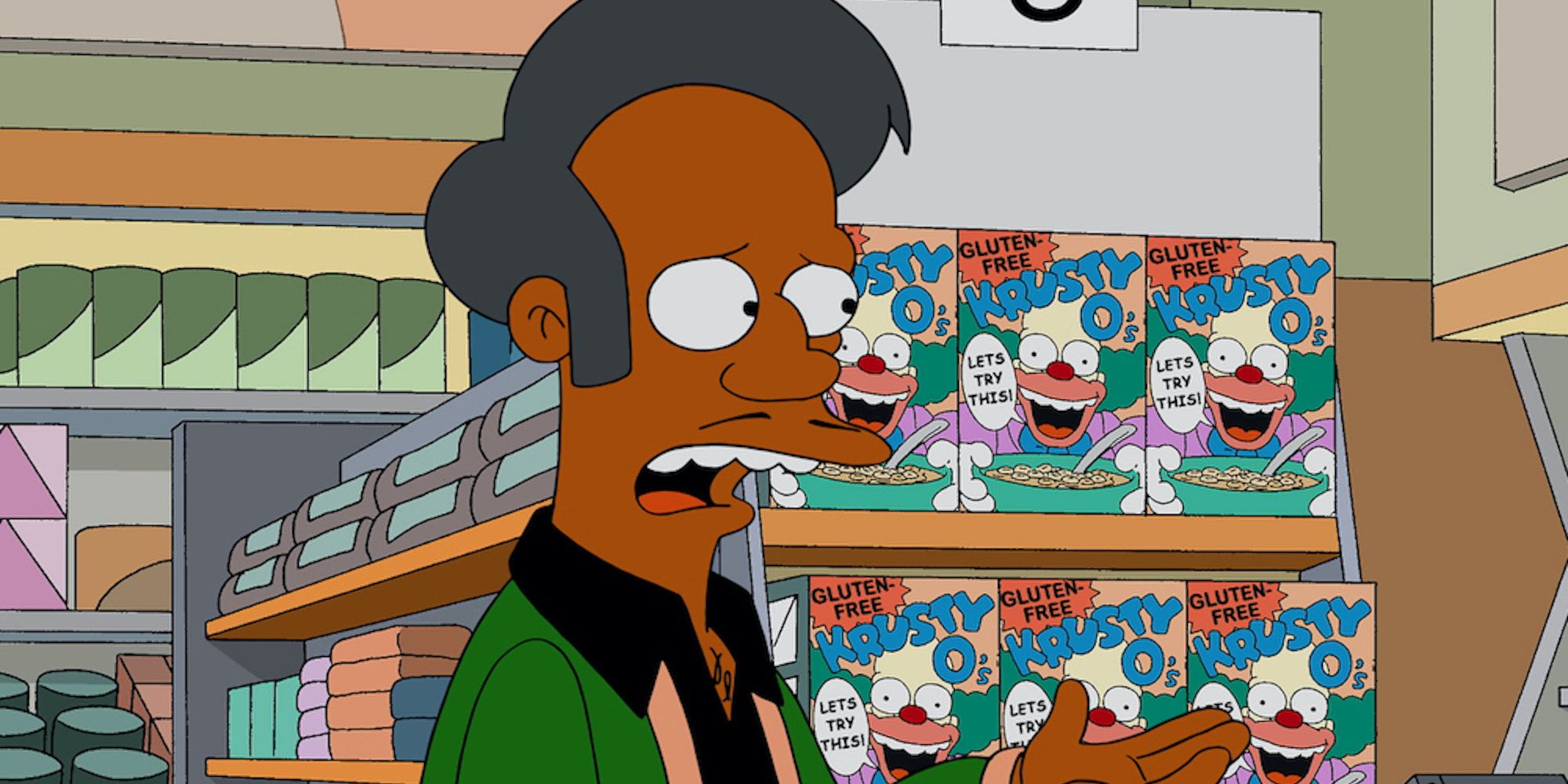 Apu in front of a stack of Krusty-O's in The Simpsons