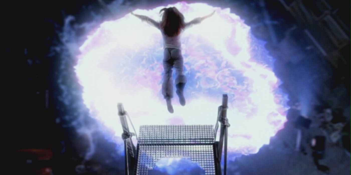 A young woman jumps into a portal in Buffy-the-Vampire-Slayer