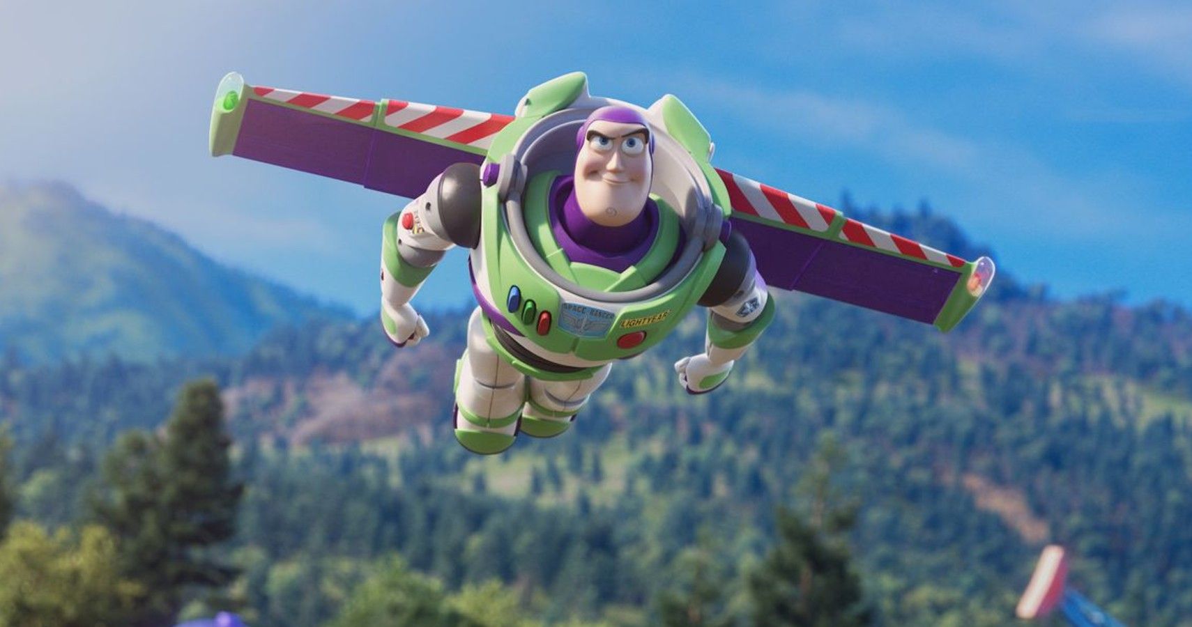 Buzz Lightyear flying through the air with a mountain backdrop.