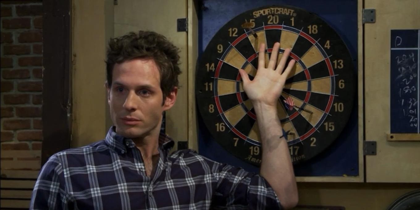 Dennis takes a dart to the hand during Chardee MacDennis in Its Always sunny In hilidelphia