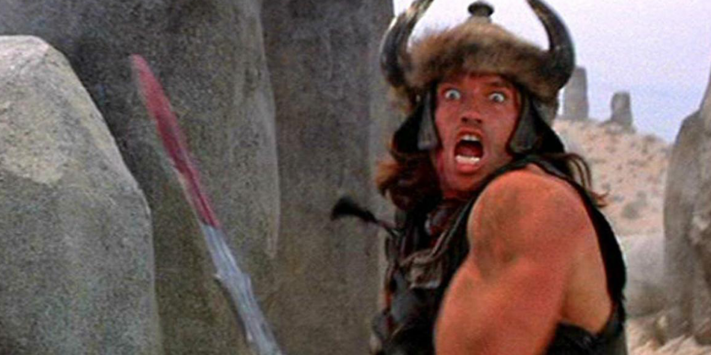 Conan wields a massive sword in Conan the Barbarian