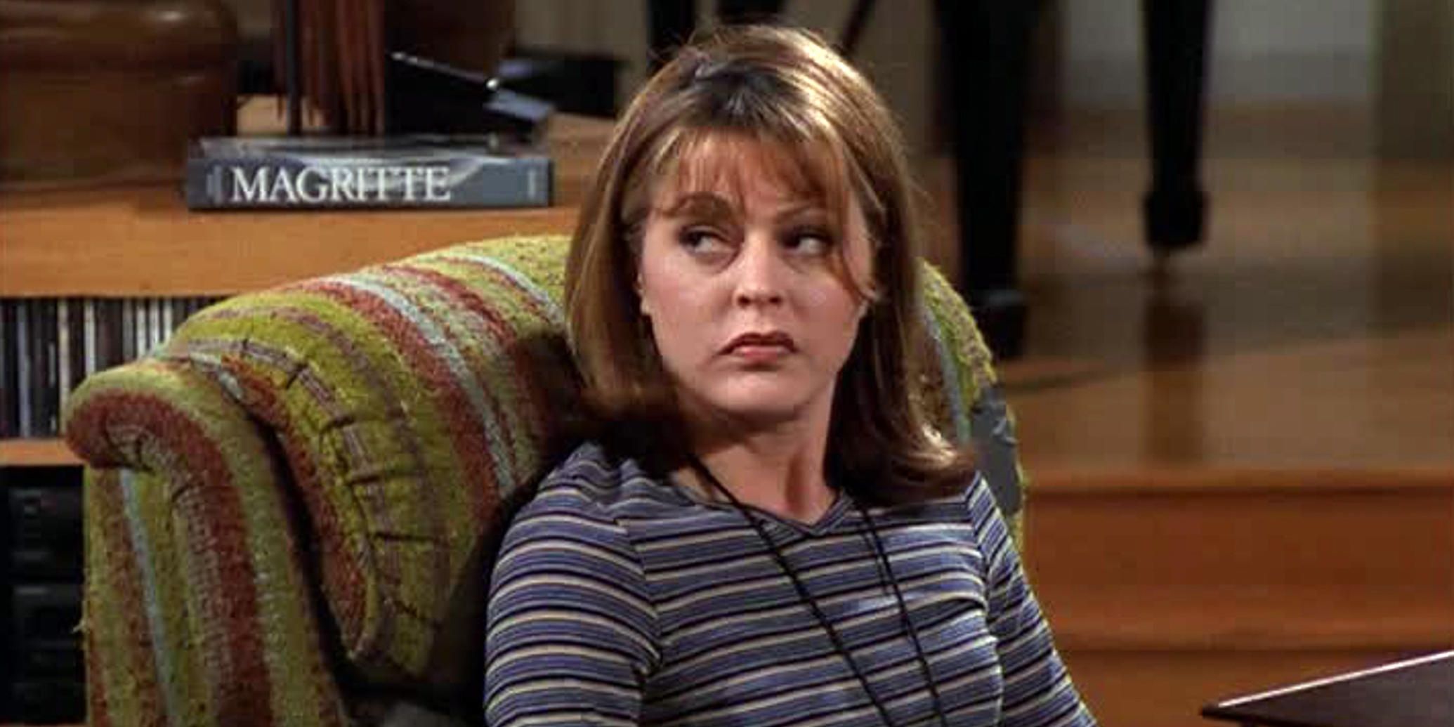 Daphne sitting in Martin's chair on Frasier