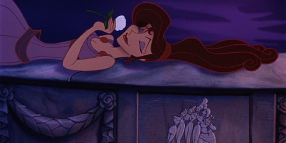 Megara lying down while smelling a rose in Hercules