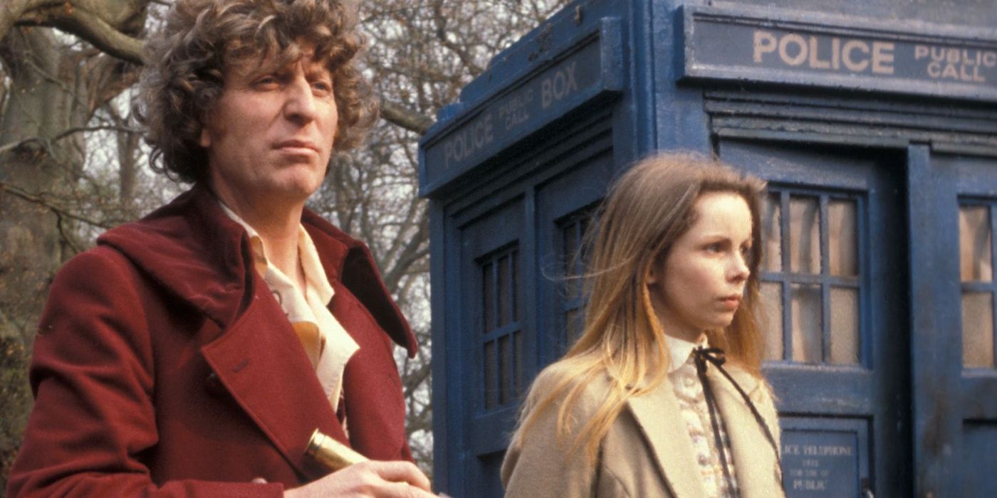 Tom Baker standing next to the TARDIS in Doctor Who