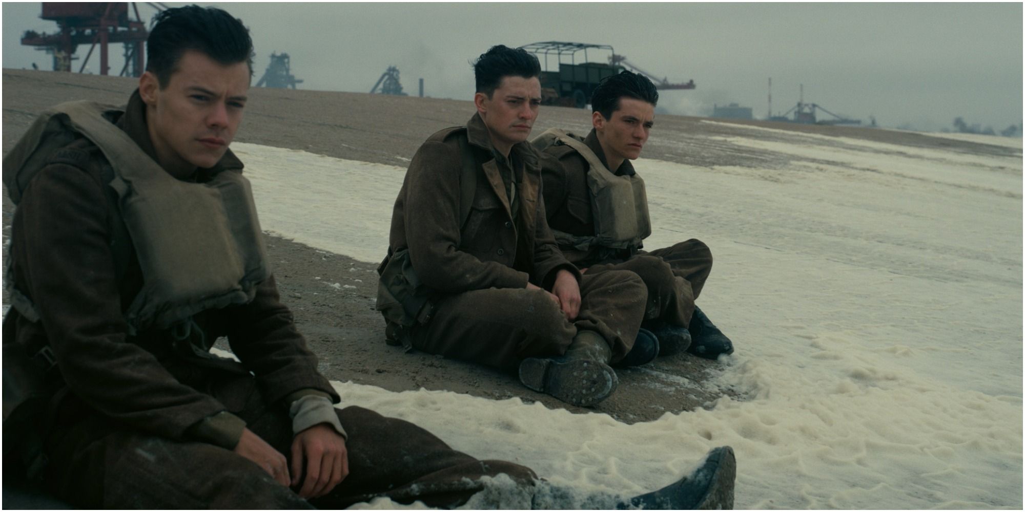 Fionn Whitehead as Tommy, Aneurin Barnard as Gibson and Harry Styles as Alex in Dunkirk 