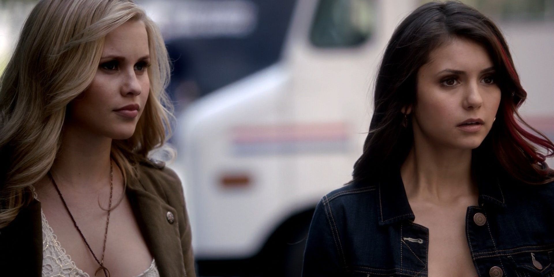 Elena and Rebekah standing together in The Vampire Diaries