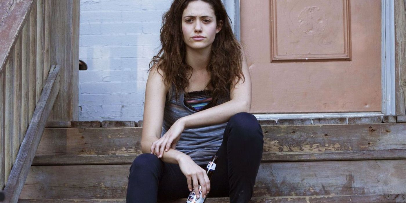 Fiona Gallagher sitting on steps in Shameless