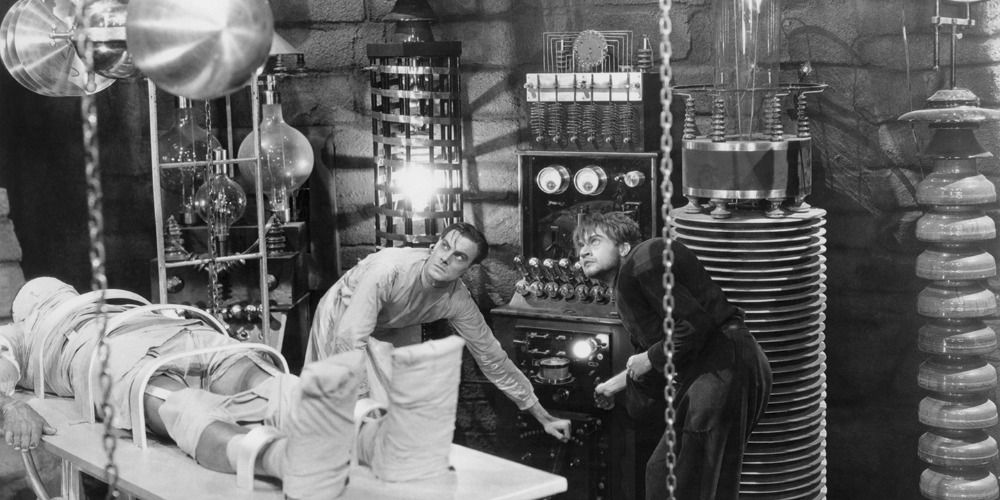 Frankenstein and Fritz in the lab with The Monster in Frankenstein (1931)