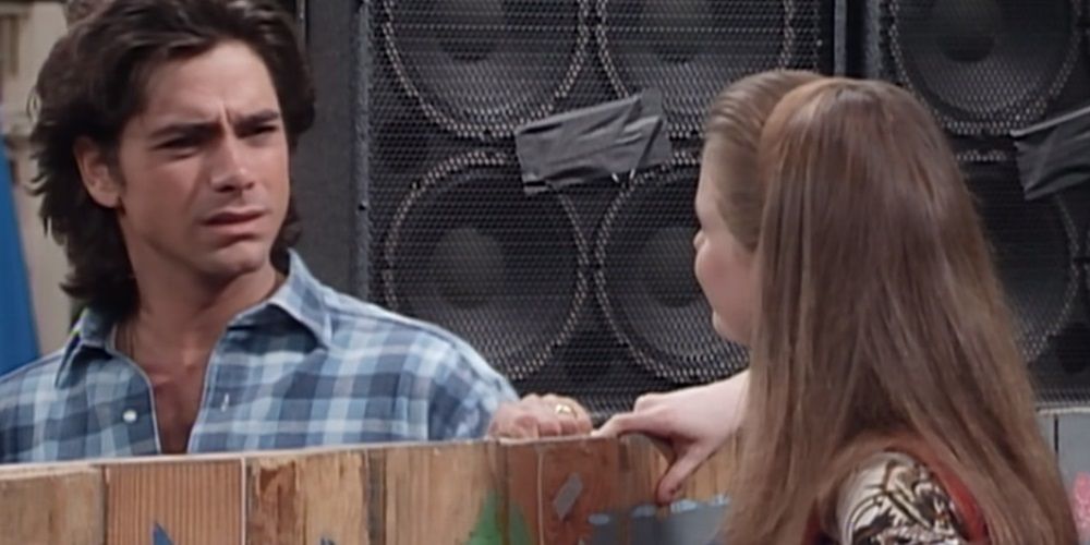 Full House image with Jesse and Kimmy arguing over a fence.