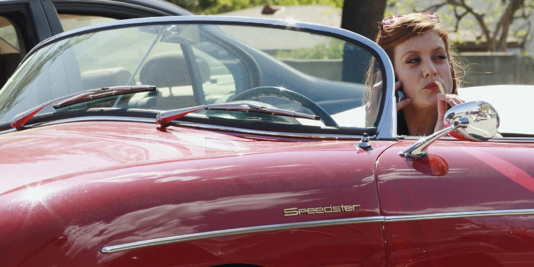 Addison in a red convertible in Grey's Anatomy