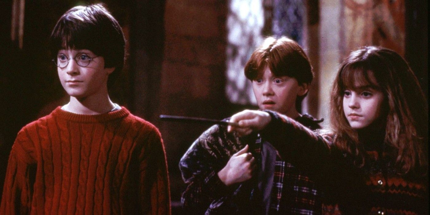 Harry, Rony e Hermione em A Pedra Filosofal