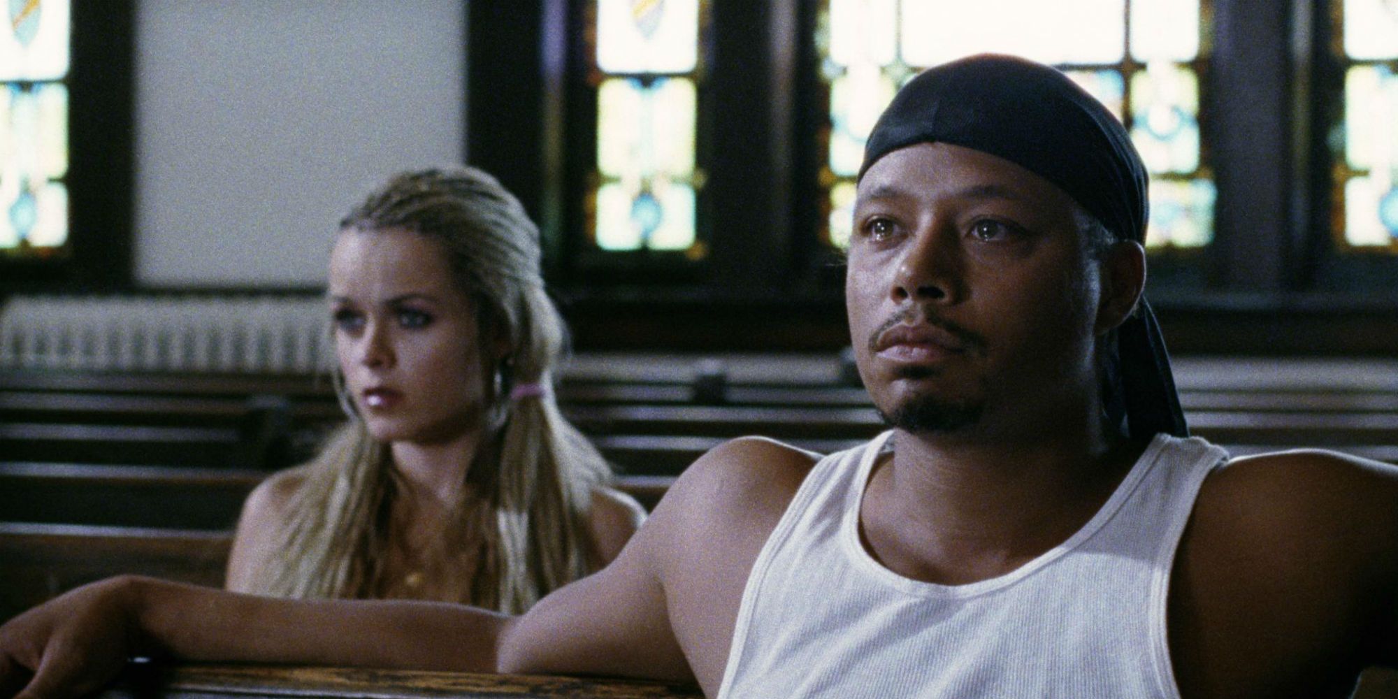 Taryn Manning and Terrence Howard sitting in a church in Hustle and Flow