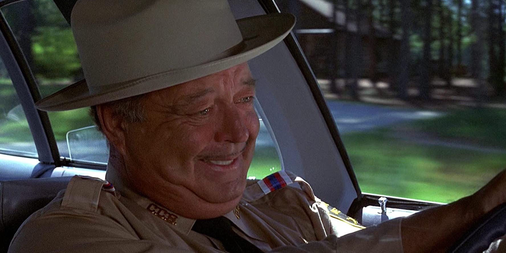 Jackie Gleason driving a car in Smokey and the Bandit