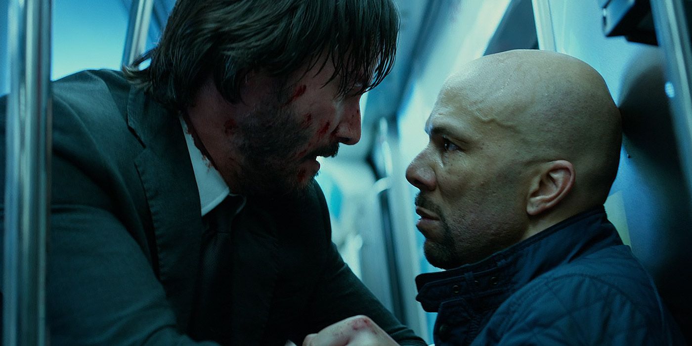 John Wick and Cassian fight on a subway train