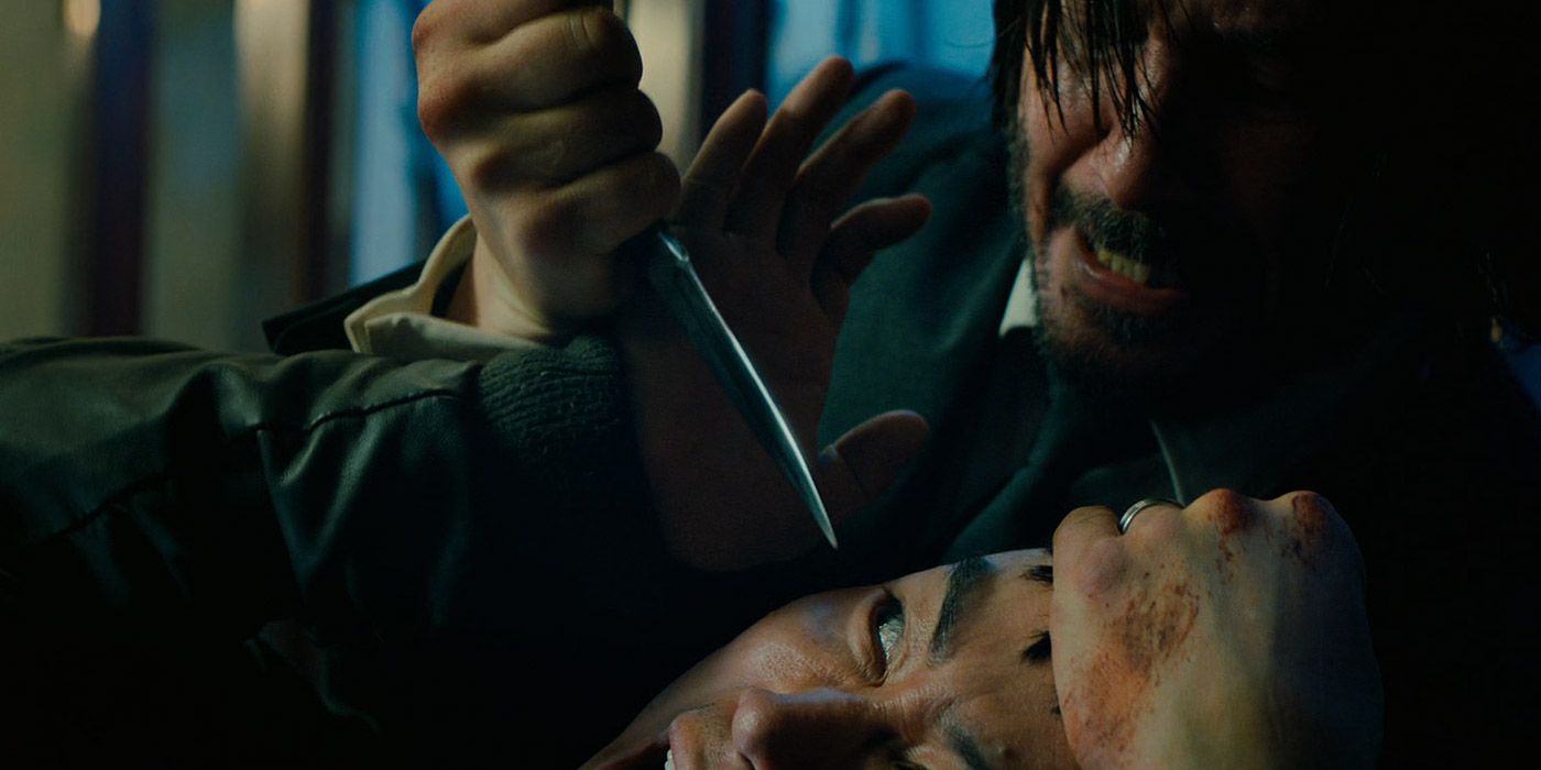 John Wick kills an assassin with a knife