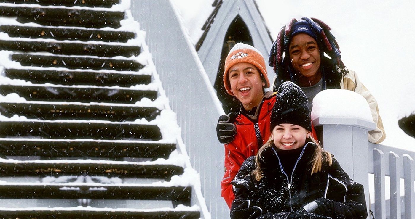 The three main characters of Johnny Tsunami outside in the snow. 