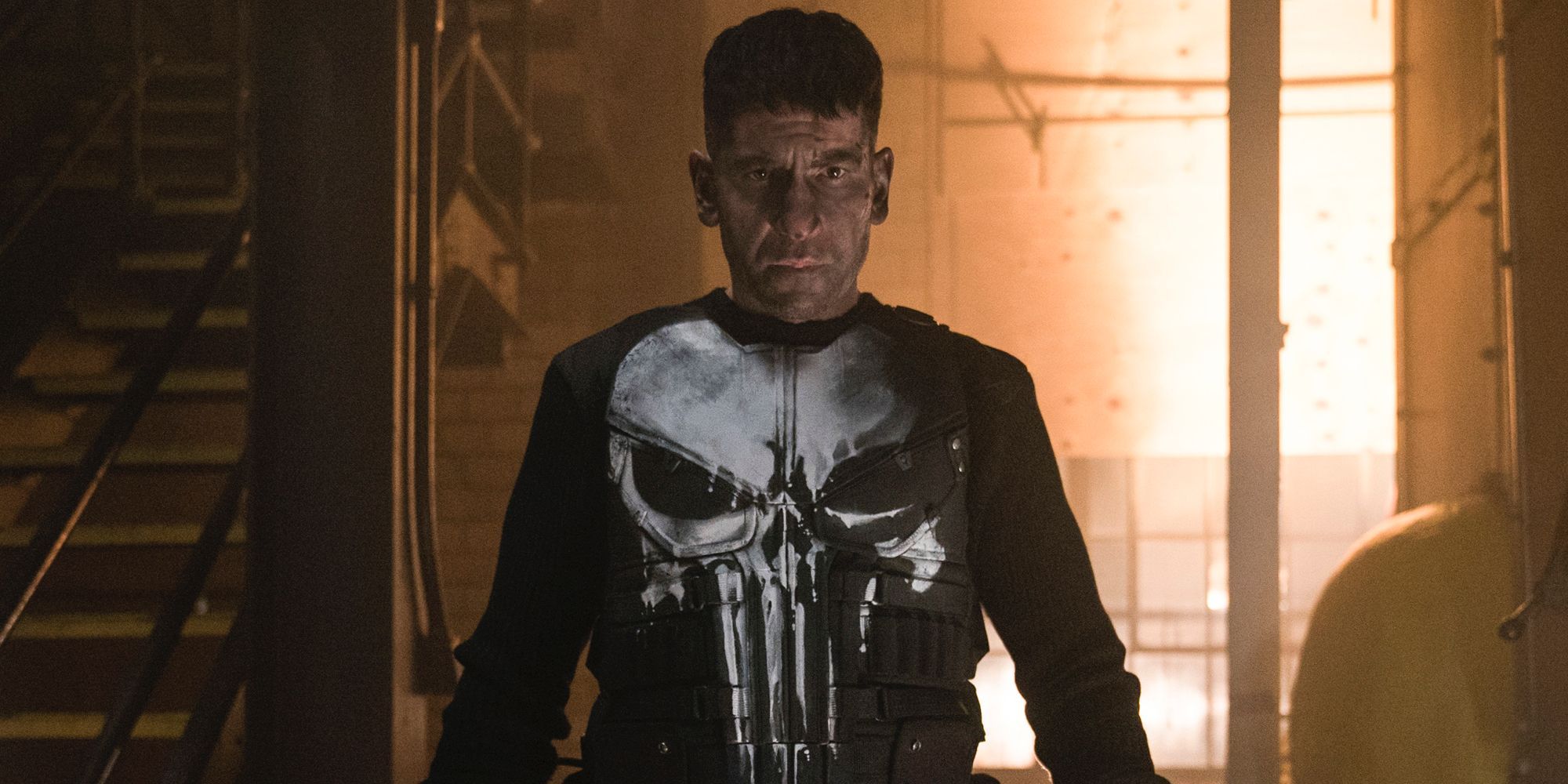 Jon Bernthal as the Punisher standing angrily 
