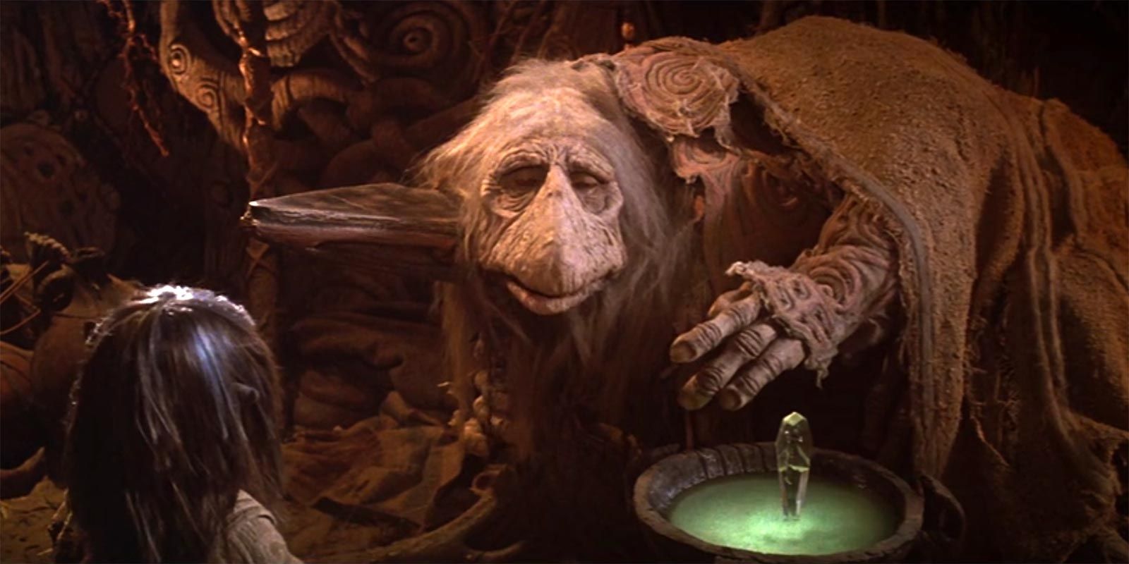 A Mystic from The Dark Crystal wearing a brown robe.