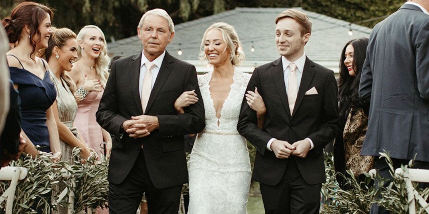 Mary Fitzgerald and Romain Bonnet Selling Sunset at their wedding smiling