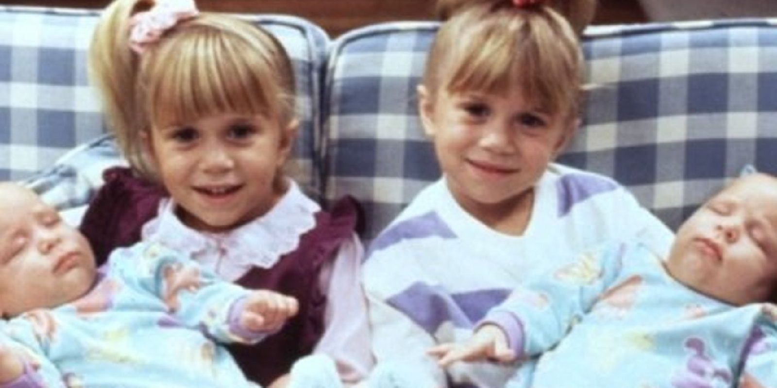Mary-Kate and Ashley Olsen holding babies in Full House