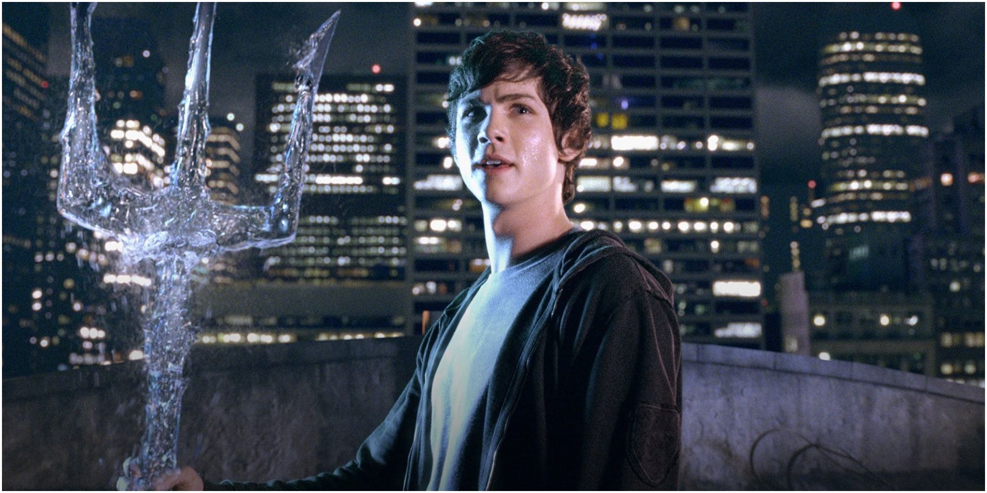 A teenager holding a trident in Percy Jackson &amp; the Olympians