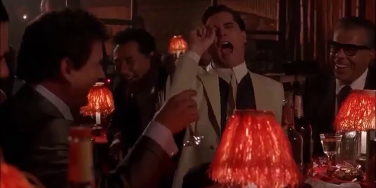 Henry laughs at Tommy's jokes in the &quot;I'm funny how?&quot; moment in Goodfellas