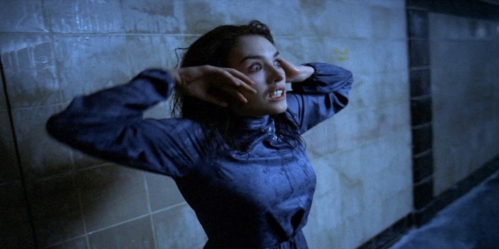 Possessed woman in a blue dress in Possession movie.