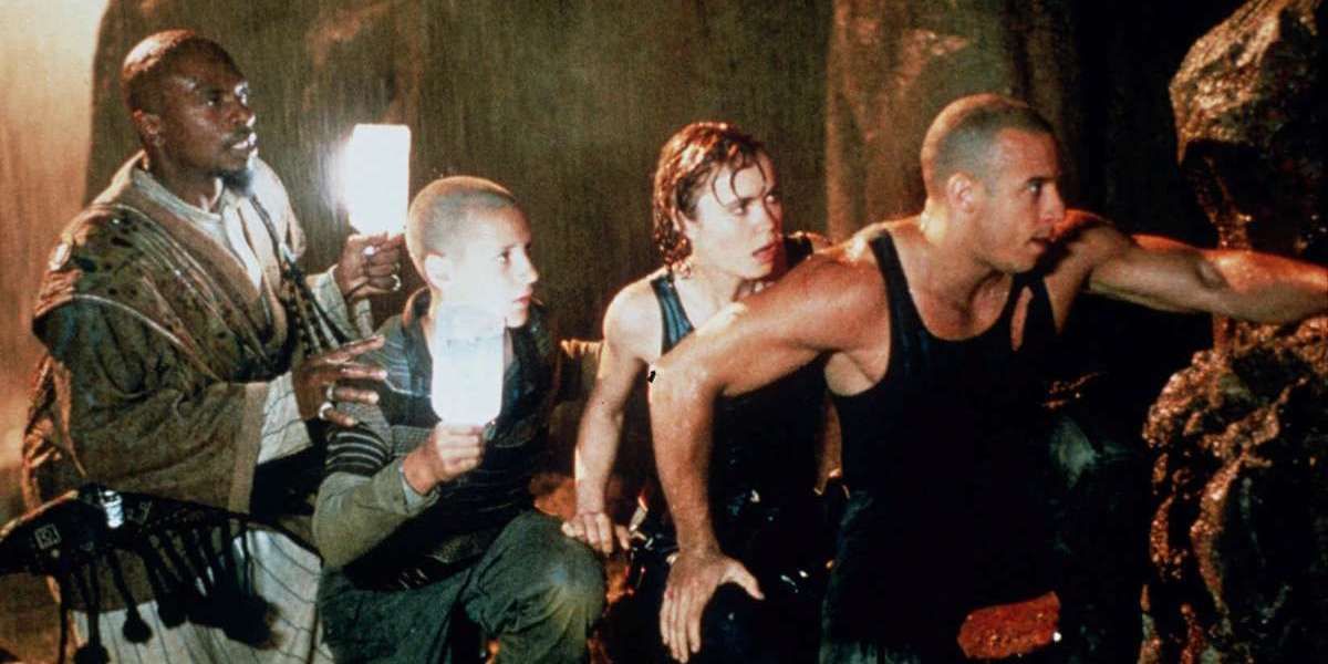 Riddick leading the survivors in Pitch Black (2000)