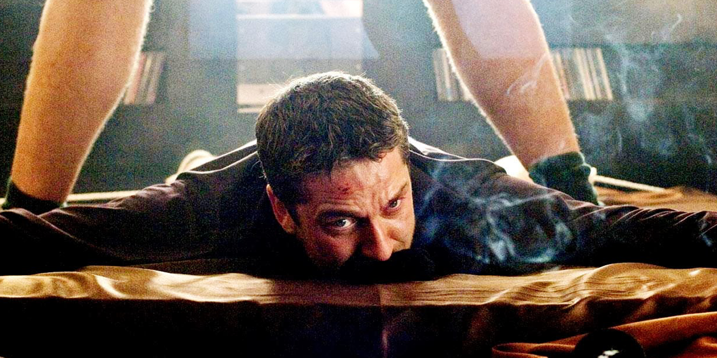 Gerard Butler pushed to the ground in RocknRolla