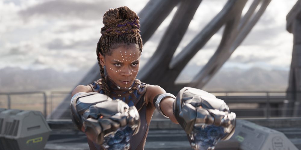 Shuri aims her gauntlets in Black Panther