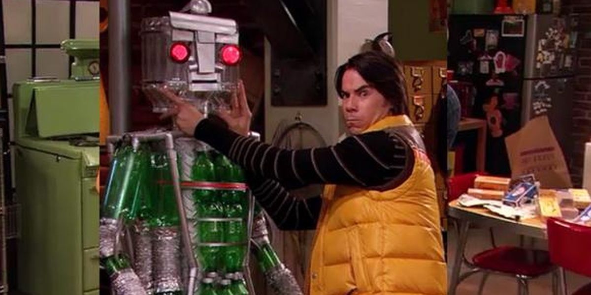 Spencer holding a robot
