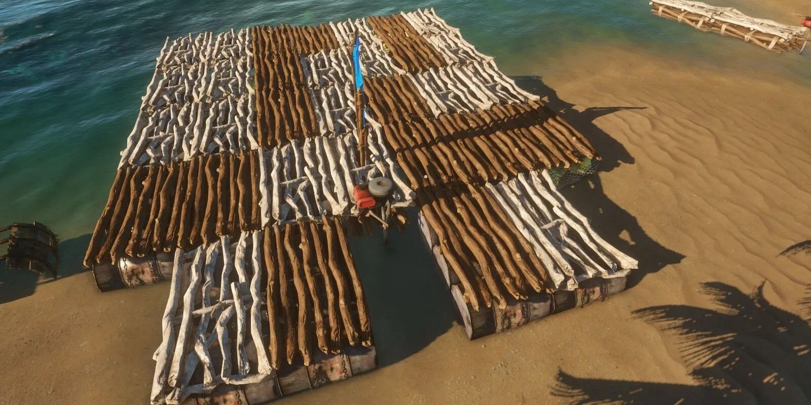 Uma imagem de uma jangada em Stranded Deep no meio da construção quando apenas o chão é visível