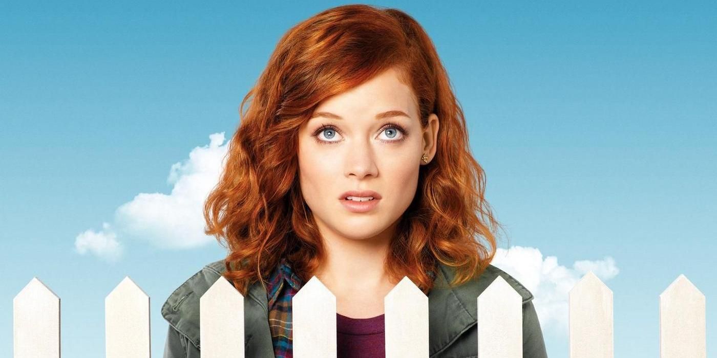 Jane Levy behind a white picket fence in Suburgatory