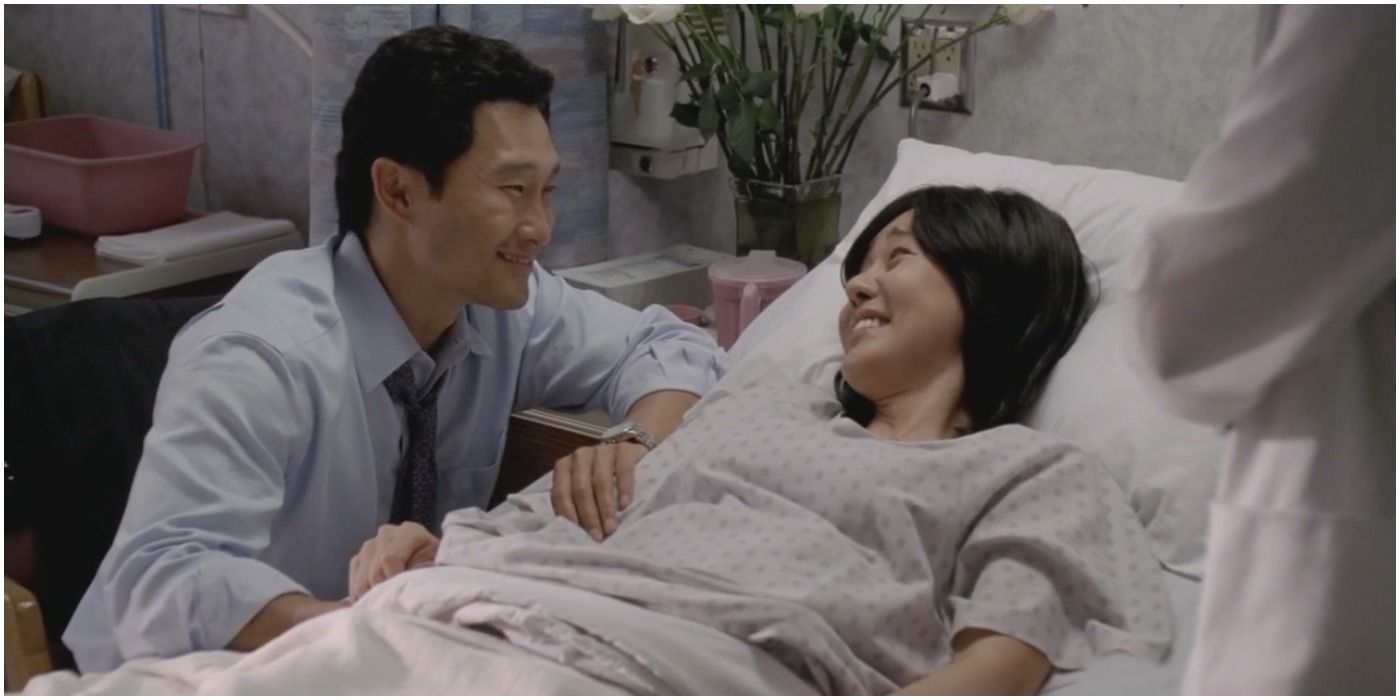 Jin and Sun smiling in the hospital during the Lost series finale
