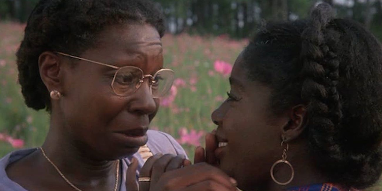 Celie smiling at a young girl in The Color Purple