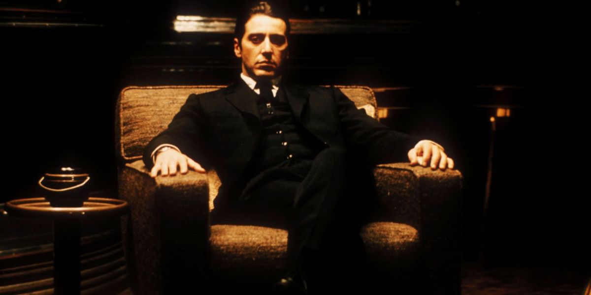 Michael sitting on a chair in The Godfather