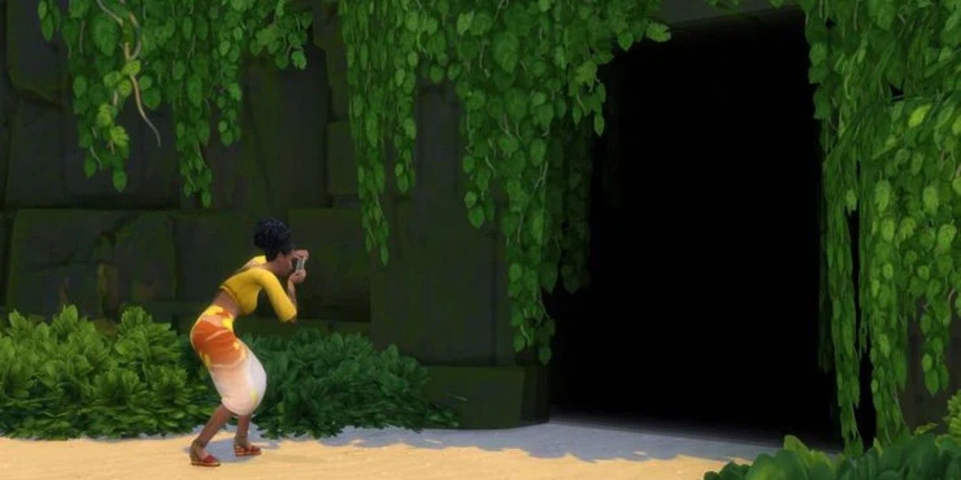 Um Sim tira fotos dentro da caverna de Sulani no The Sims 4