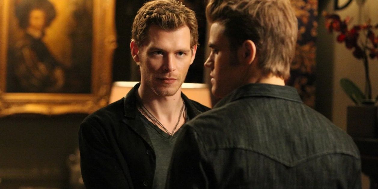 Klaus in a black jacket and grey tee