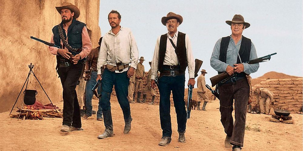 The gunslingers walk into the final shootout in The Wild Bunch