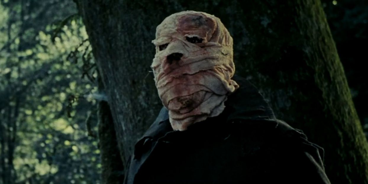 A masked figure in a forest in 2007's Timecrimes
