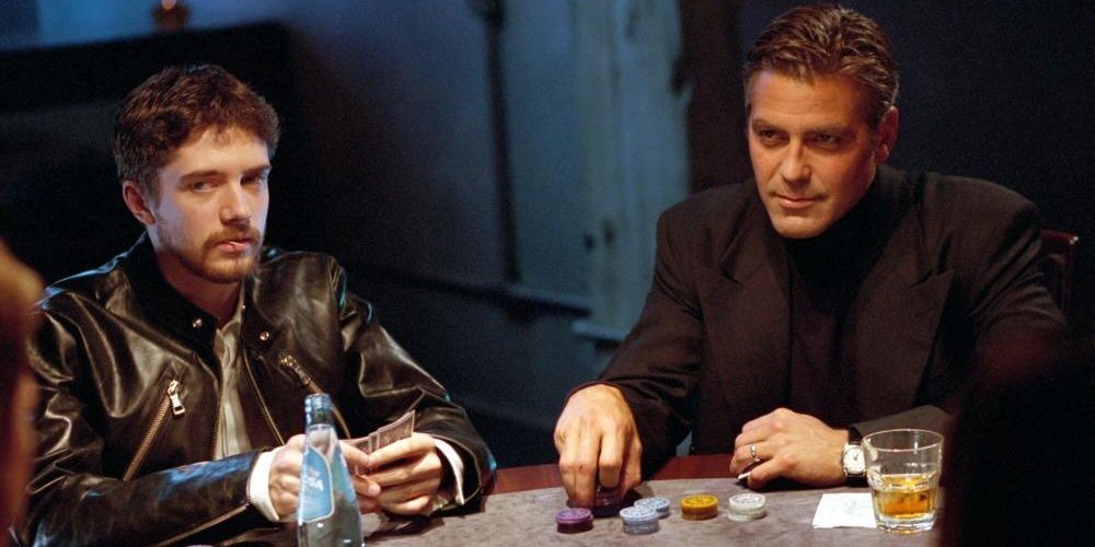 Danny playing poker with Topher Grace in Ocean's Eleven
