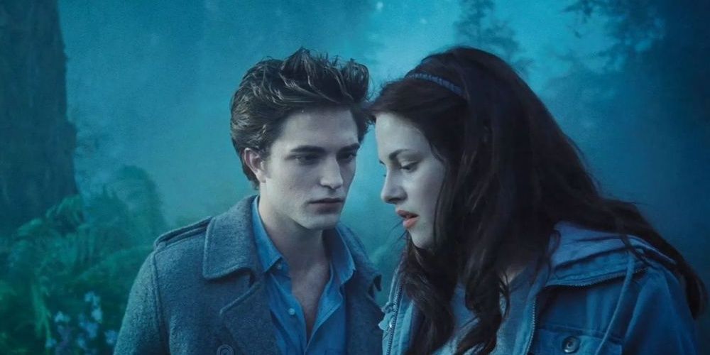 Edward looks intensely at Bella in Twilight.