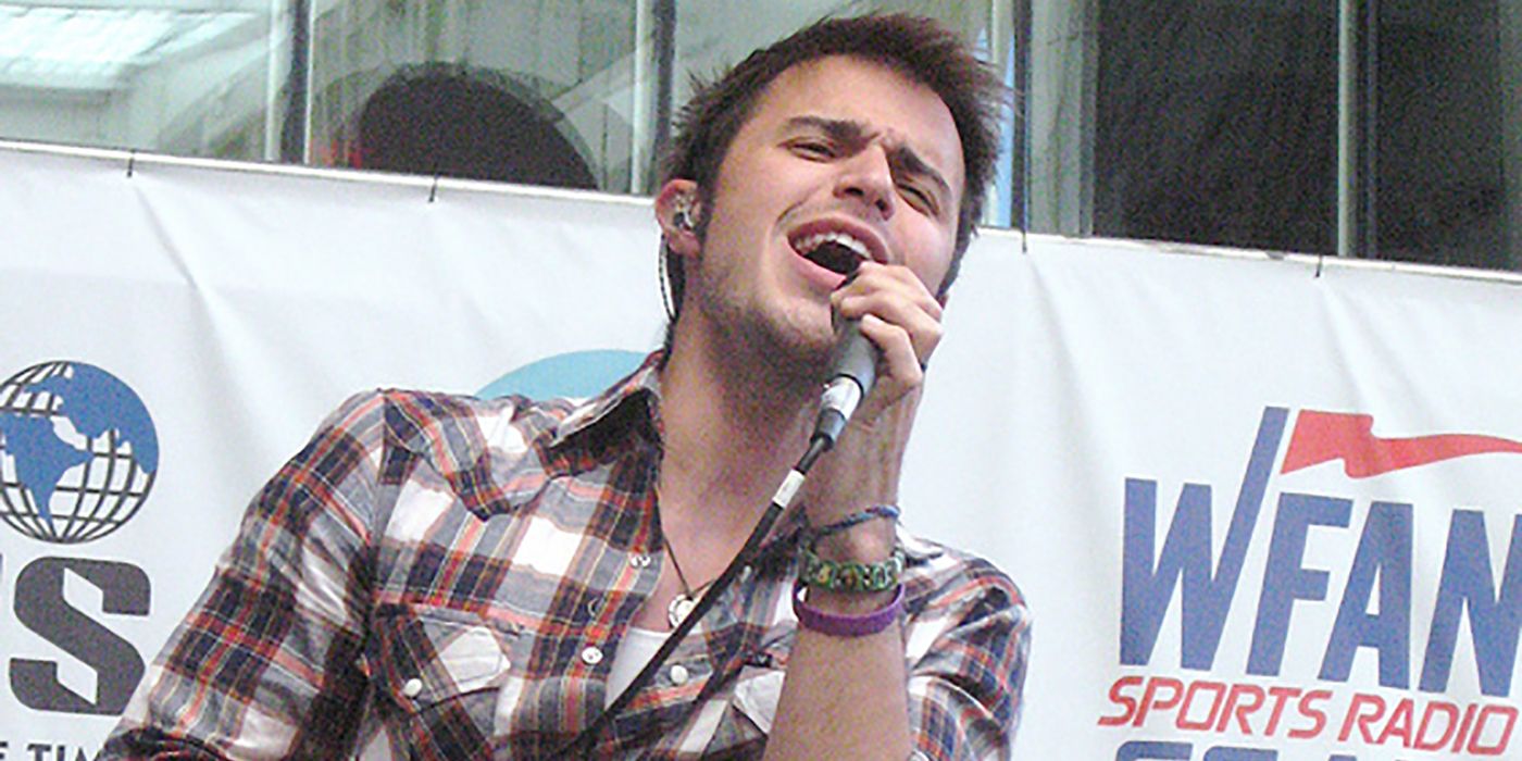 Kris Allen performing on stage