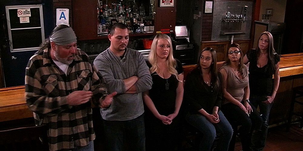 Bar owners sitting by the bar on Bar Rescue